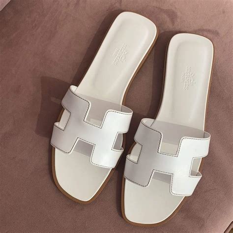 hermes white slides|hermes oran slippers price.